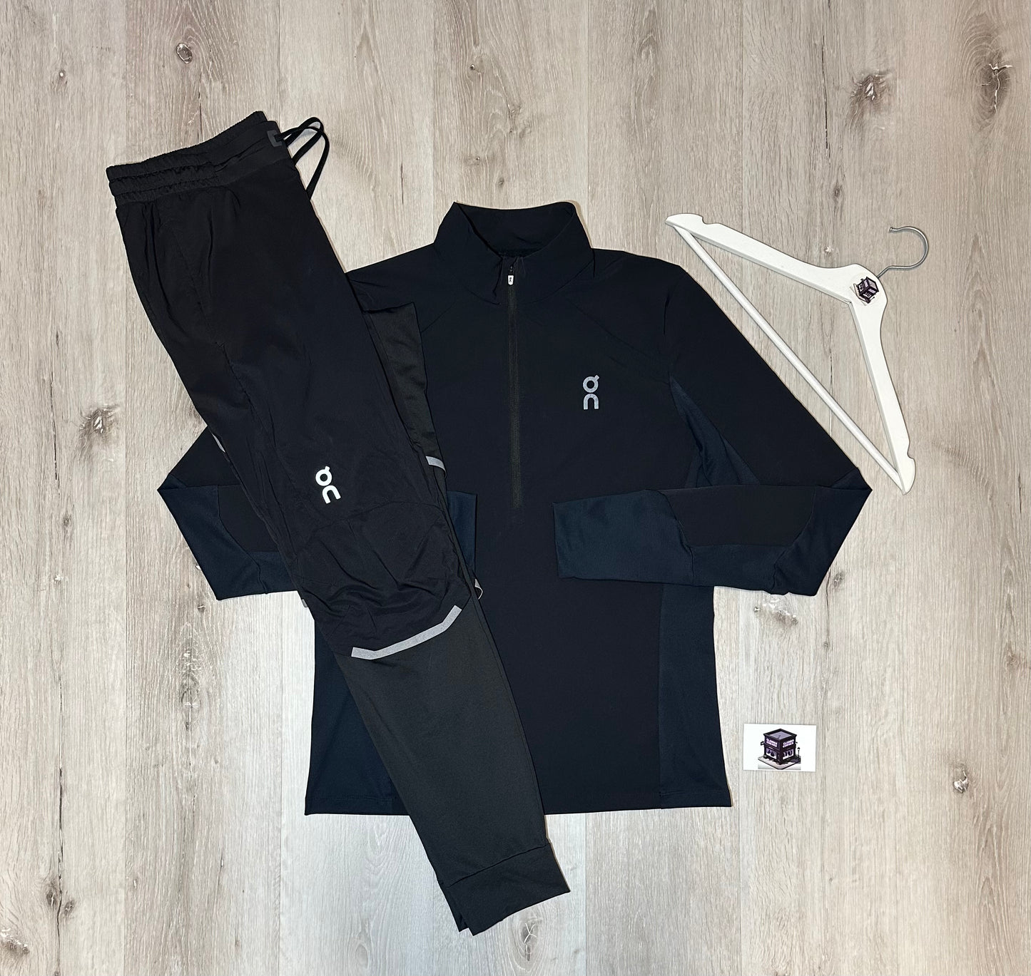 ON RUNNING TRACKSUIT BLACK/NAVY SIZE MEDIUM
